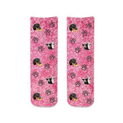 Cute photo faces cropped into design and printed in all over pink wash background with paw prints all over on cotton crew socks is the perfect gift!