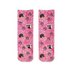 Cute photo faces cropped into design and printed in all over pink wash background with paw prints all over on cotton crew socks is the perfect gift!