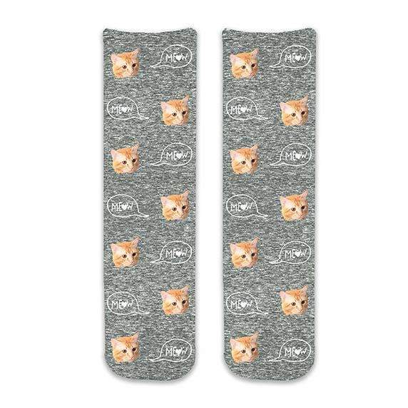 Custom printed cotton crew socks digitally printed in an all over design personalized using your own photo we the text meow in a text bubble on gray granular background.