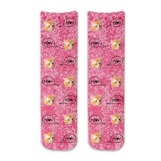 Custom printed cat face photo socks using your own photos printed in all over design on pink wash background and meow text bubble digitally printed on cotton crew socks is the perfect pair of socks to show support for breast cancer awareness.