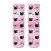 Custom printed cat face photo socks using your own photos printed in all over design on pink wash background and meow text bubble digitally printed on cotton crew socks.