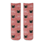 Custom printed cat face photo socks using your own photos printed in all over design on red granular background and meow text bubble digitally printed on cotton crew socks.