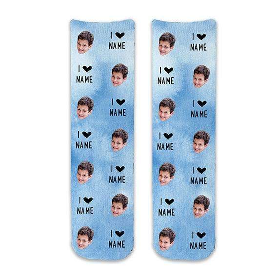 Use your photos to make fun socks for valentines day or any holiday gift idea, fun custom printed photo face socks with I heart and text printed in all over design with blue wash background on cotton crew socks.