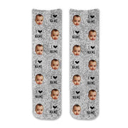 Fun photo socks printed with faces cropped in on light gray speckle background design digitally printed with I love and name on them are great for any occasion.
