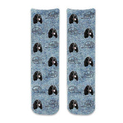 Cool cotton crew socks custom printed with dog photos and the text woof in all over design on a blue denim background personalized using your own photo cropped and printed on the socks.