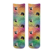 Cute dog face photo socks custom printed on a rainbow wash background and personalized using your own photo faces cropped in and printed all over the cotton crew socks make a unique pair of socks to wear to the pride run walk.