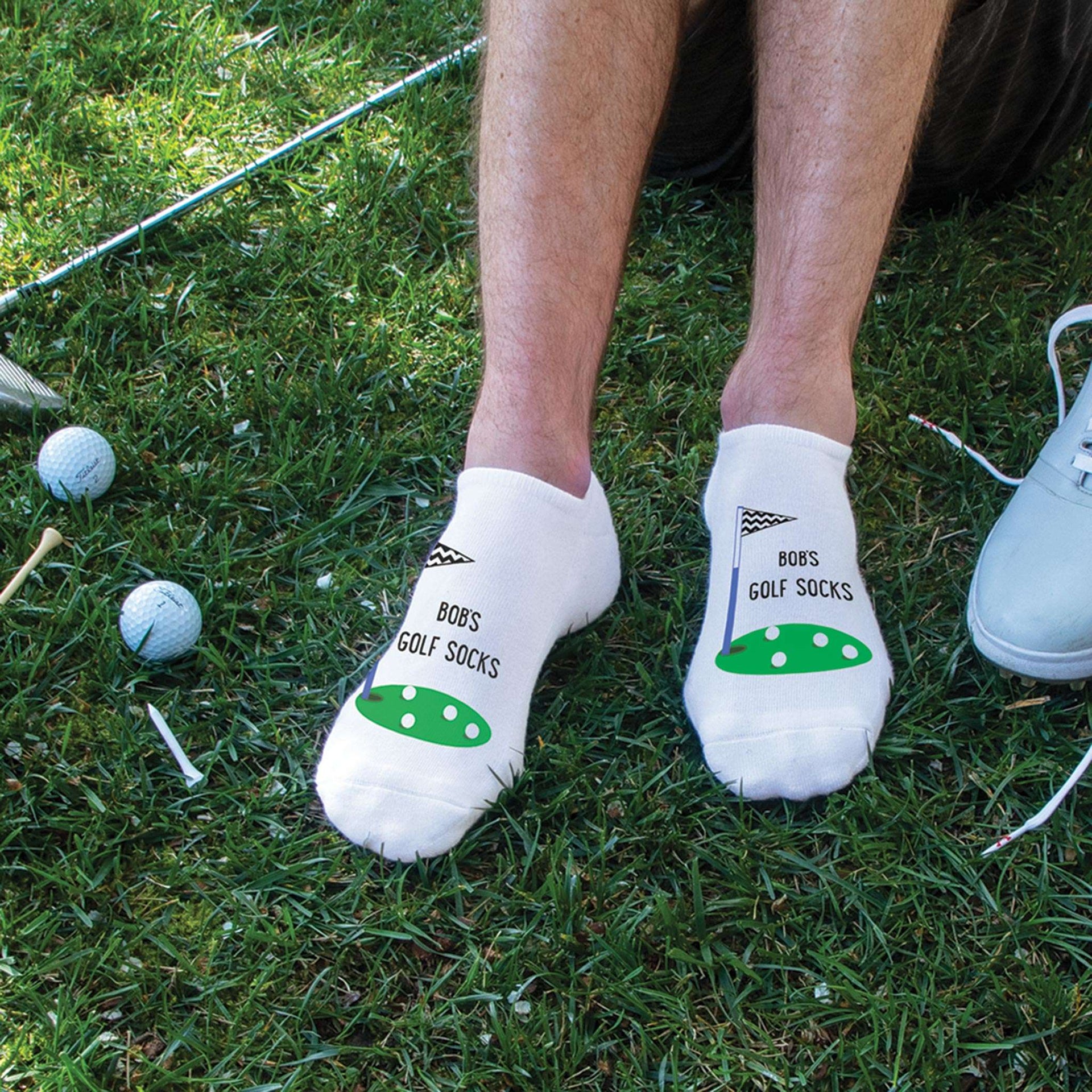 Fun personalized golf socks for men with your name sold in a three pair gift box set.