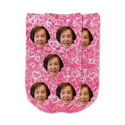 A heart design with pink speckle background digitally printed on cotton no show footie socks personalized with your own photo socks make a unique gift for breast cancer awareness.