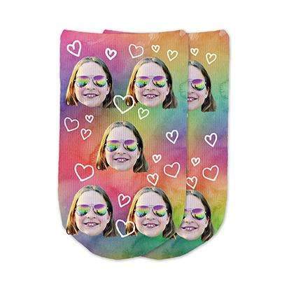 A heart design with rainbow wash background digitally printed on cotton no show footie socks personalized with your own photo socks make a unique gift.