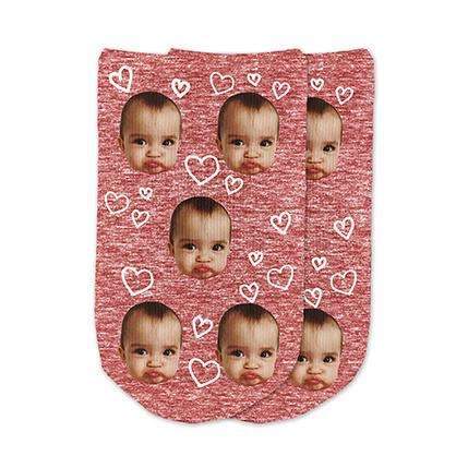 A heart design with red granular background digitally printed on cotton no show footie socks personalized with your own photo socks make a unique gift.