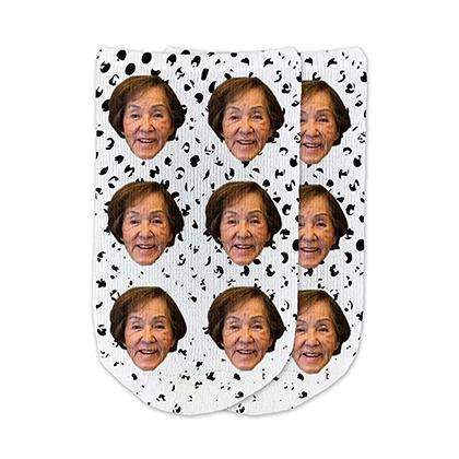 Funny photo face socks custom printed on black dot grunge background and personalized using your own photo faces cropped in and printed all over the top of the cotton no show footie socks make a unique gift idea.