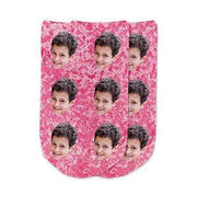 Super cute photo face socks custom printed on pink granular background and personalized using your own photo faces cropped in and printed all over the top of the cotton no show footie socks make a unique gift idea to show support for breast cancer awareness!