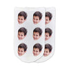 Super cute photo face socks custom printed on a white cotton background and personalized using your own photo faces cropped in and printed all over the top of the cotton no show footie socks make a unique gift idea.