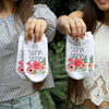Phi Sigma Sigma sorority name with watercolor floral design custom printed on white cotton no show socks