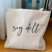 Sigma Delta Tau sorority nickname custom printed on canvas tote bag is the perfect college tote bag.